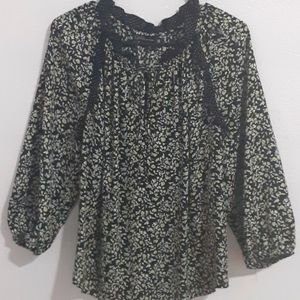 black blouse with small yellow flower print